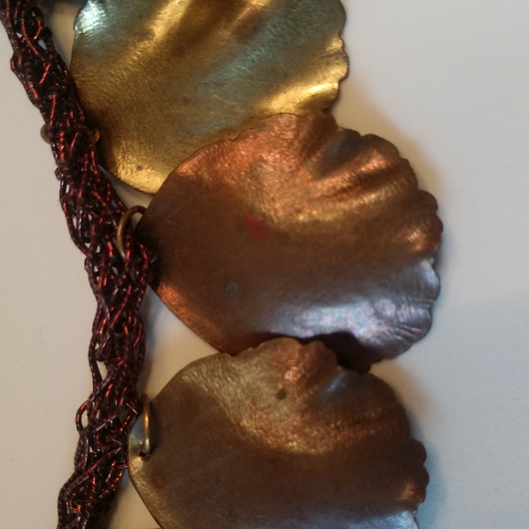 Sculpted metal petals on braided maroon cord necklace - Picture 2 of 3